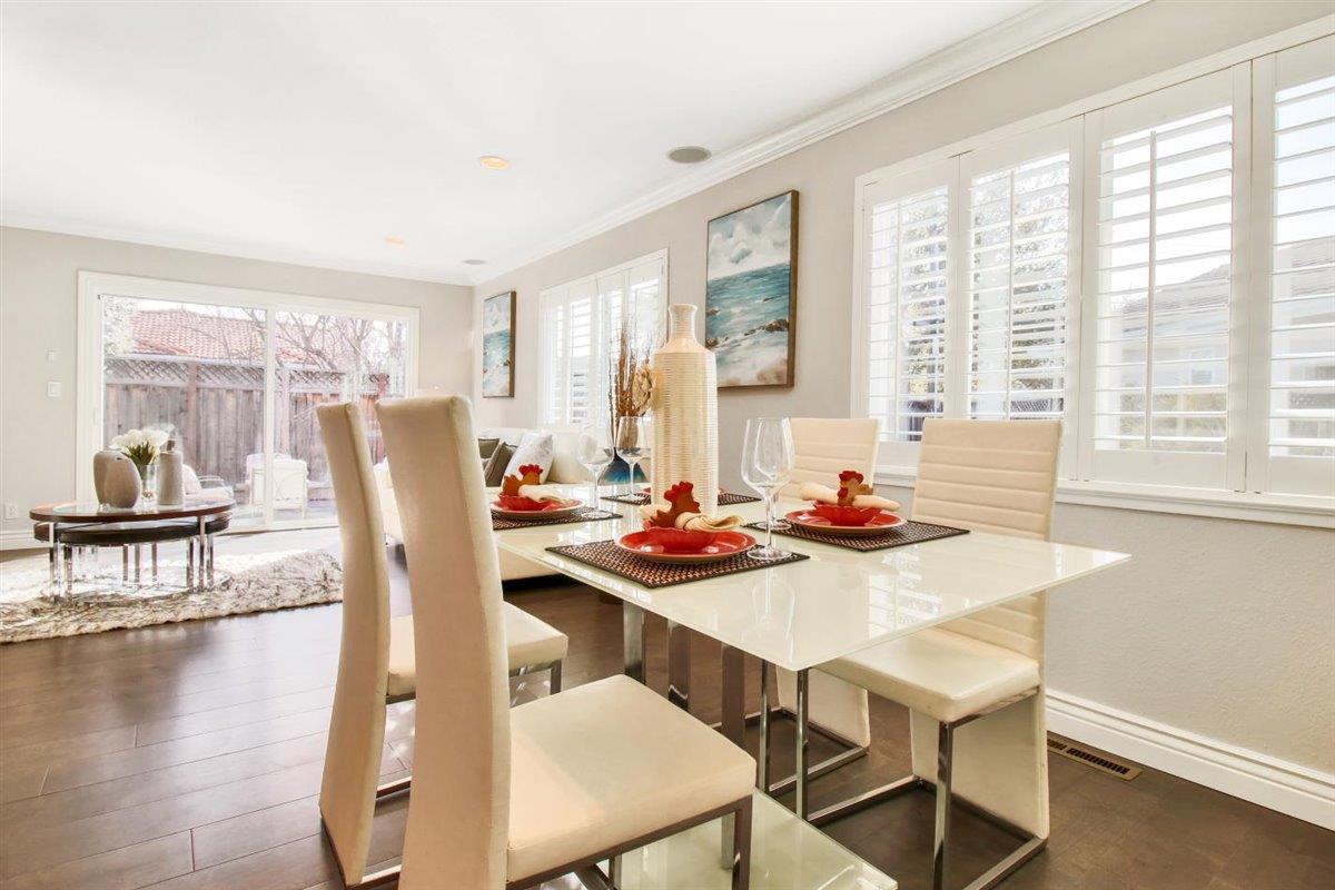 10846 Willowbrook Way Cupertino, CA 95014 - Photo 11 of 48 a view of a dining room with furniture and wooden floor