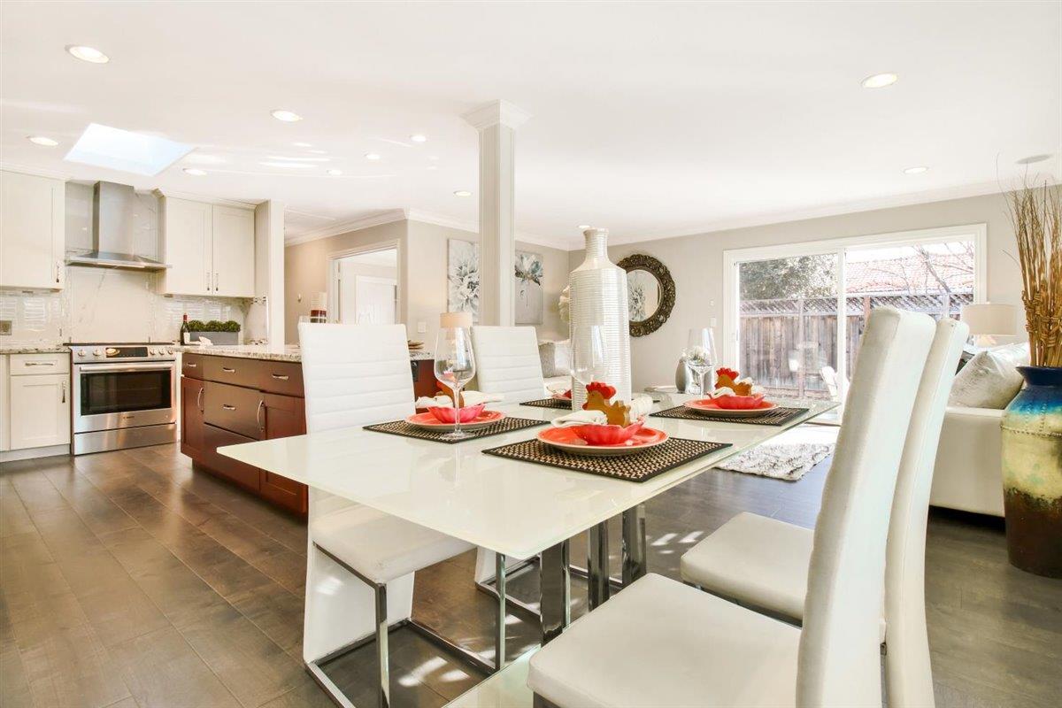 10846 Willowbrook Way Cupertino, CA 95014 - Photo 12 of 48 a view of a dining room with furniture and wooden floor