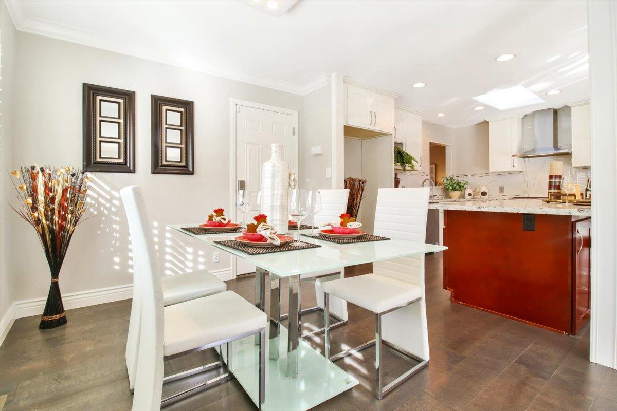 10846 Willowbrook Way Cupertino, CA 95014 - Photo 13 of 48 a view of a dining room with furniture