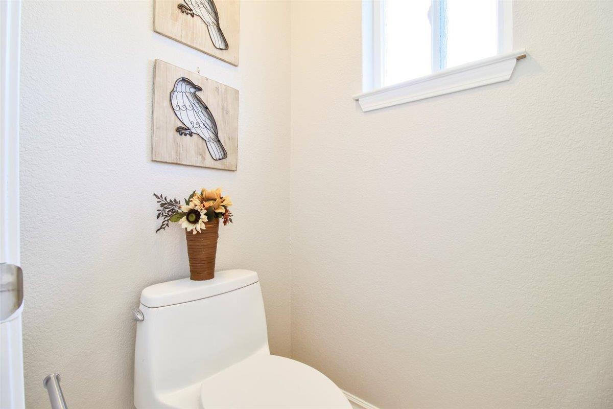 10846 Willowbrook Way Cupertino, CA 95014 - Photo 22 of 48 a white toilet sitting next to a window