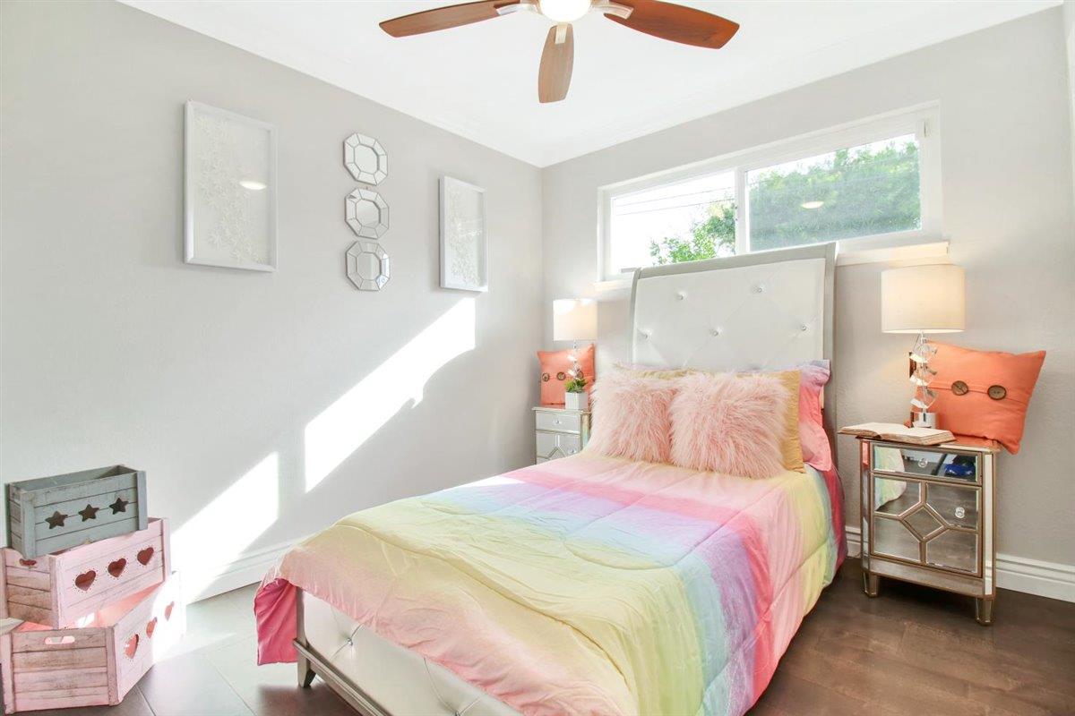 10846 Willowbrook Way Cupertino, CA 95014 - Photo 28 of 48 a bedroom with a bed and a tv on the dresser