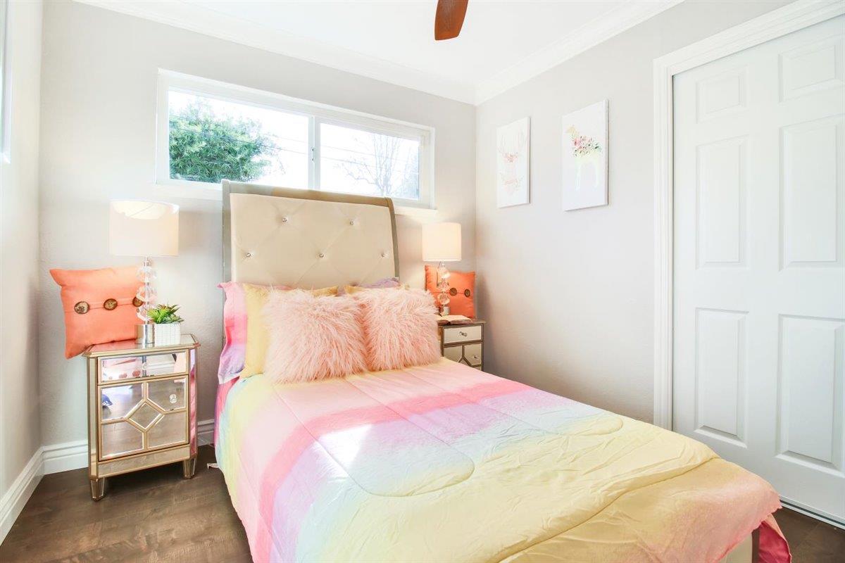 10846 Willowbrook Way Cupertino, CA 95014 - Photo 29 of 48 a bedroom with a bed and a window