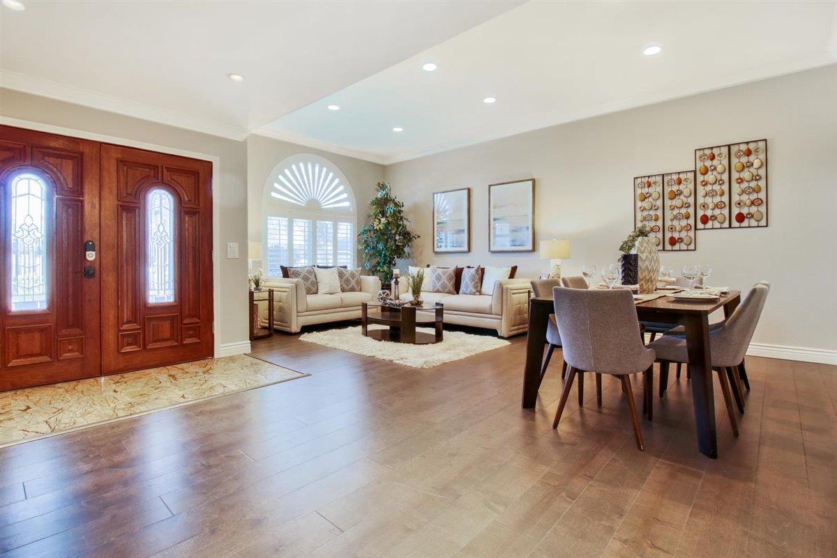 10846 Willowbrook Way Cupertino, CA 95014 - Photo 3 of 48 a view of a livingroom with furniture window and wooden floor