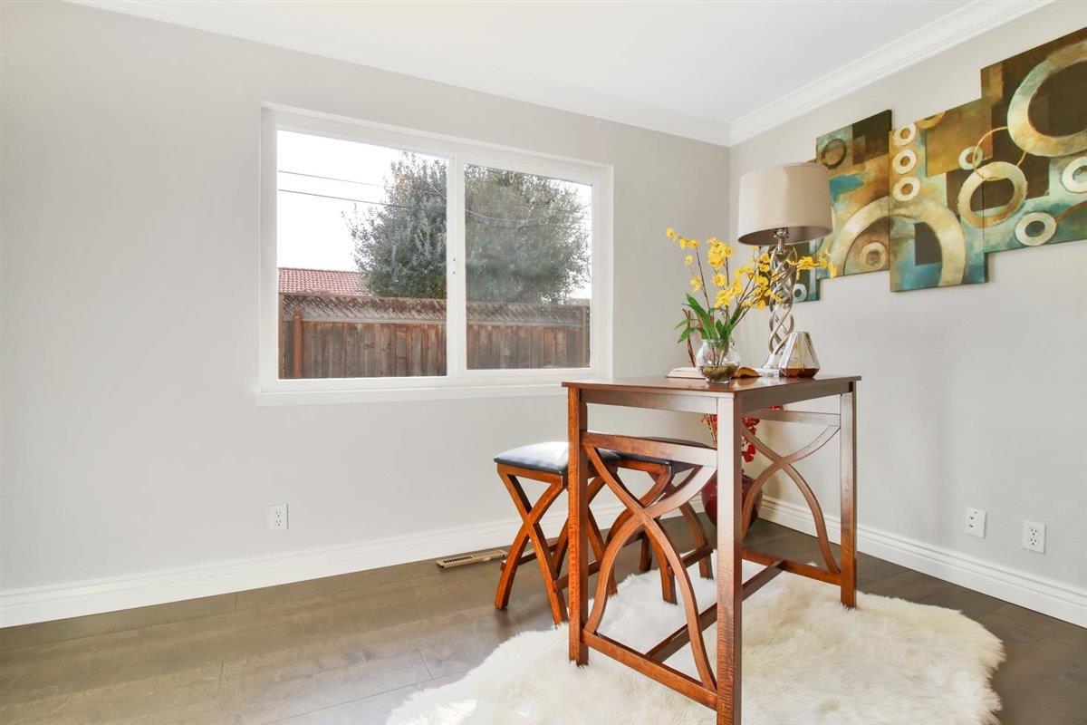 10846 Willowbrook Way Cupertino, CA 95014 - Photo 31 of 48 a dining room with furniture and a window