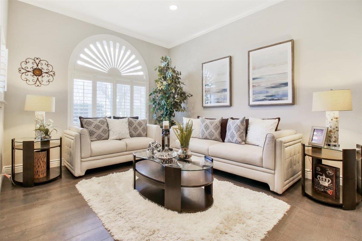 10846 Willowbrook Way Cupertino, CA 95014 - Photo 4 of 48 a living room with furniture and a large window