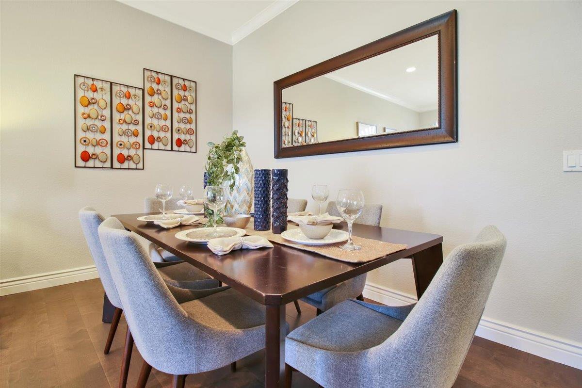 10846 Willowbrook Way Cupertino, CA 95014 - Photo 5 of 48 a view of a dining room with furniture and wooden floor