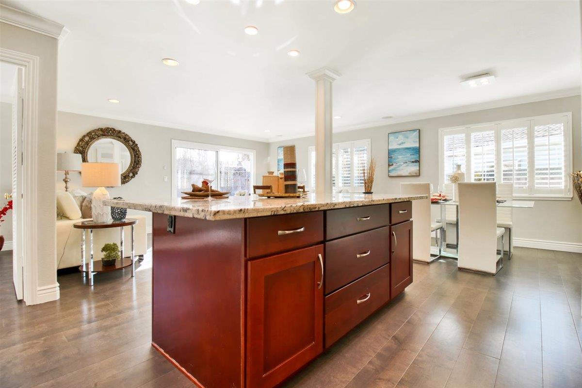 10846 Willowbrook Way Cupertino, CA 95014 - Photo 8 of 48 a living room with stainless steel appliances granite countertop furniture a kitchen view and living room