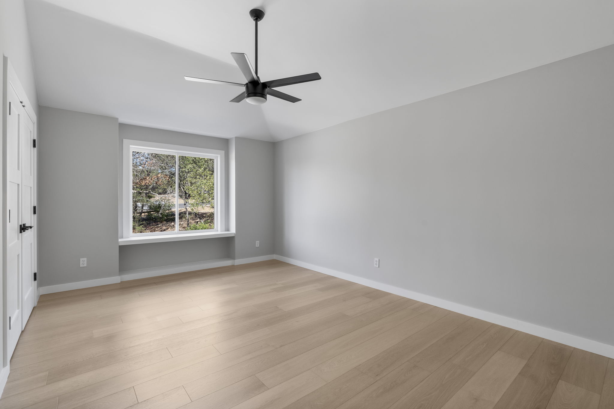 701 Furlong Drive Austin, TX 78746 - Photo 29 of 40 a view of an empty room with a window