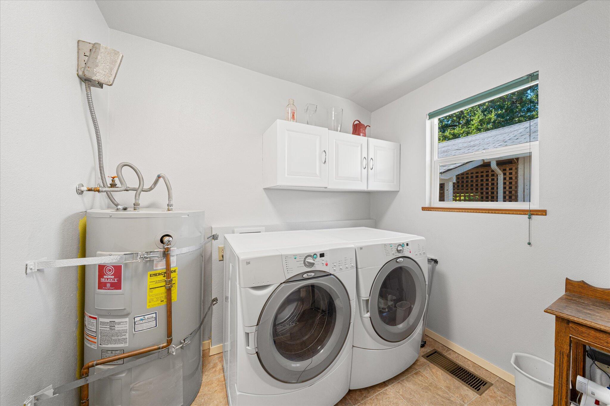 10241 Deschutes Road Palo Cedro, CA 96073 - Photo 29 of 56 a utility room with dryer and washer