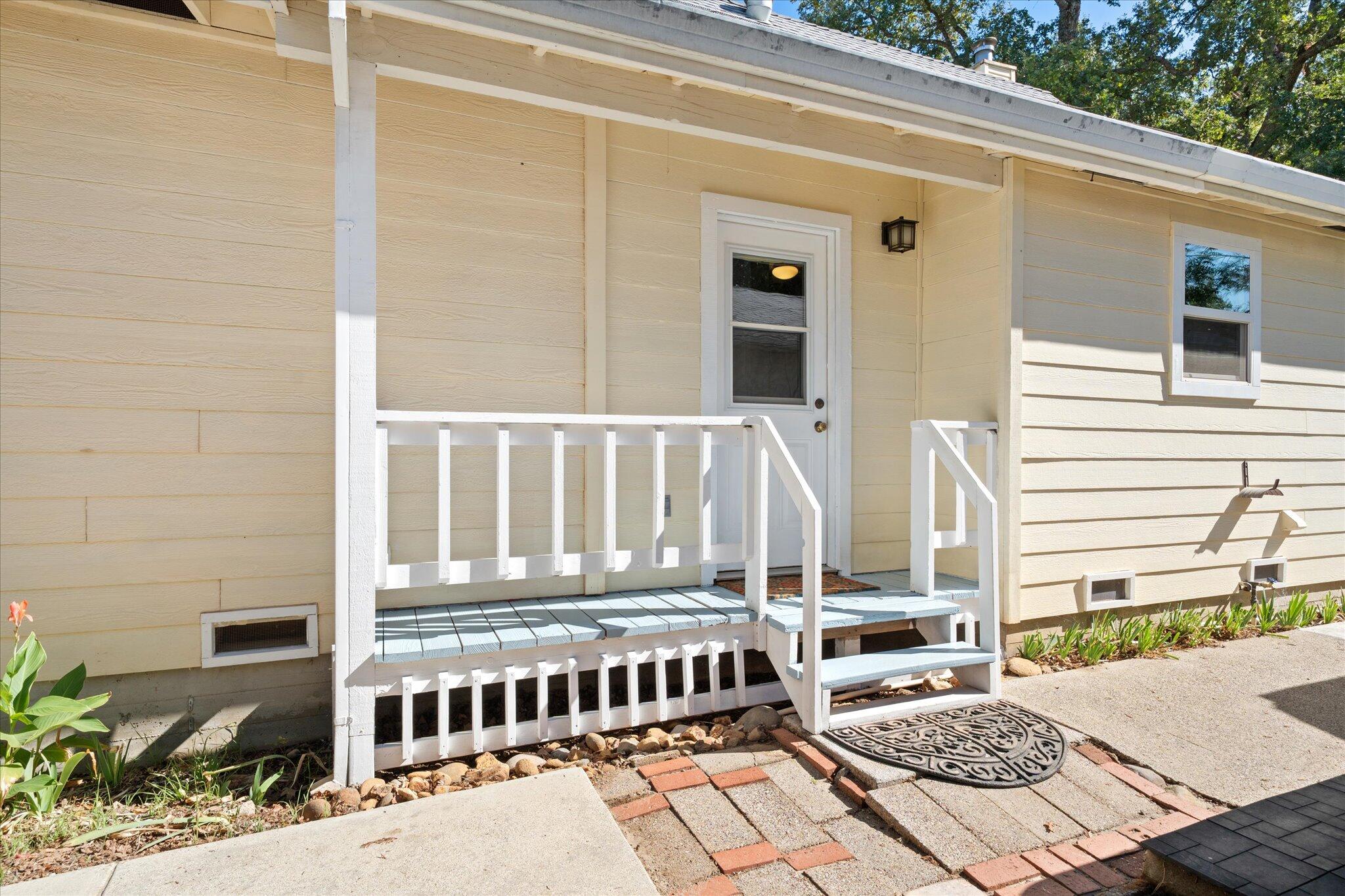 10241 Deschutes Road Palo Cedro, CA 96073 - Photo 39 of 56 a view of a front door