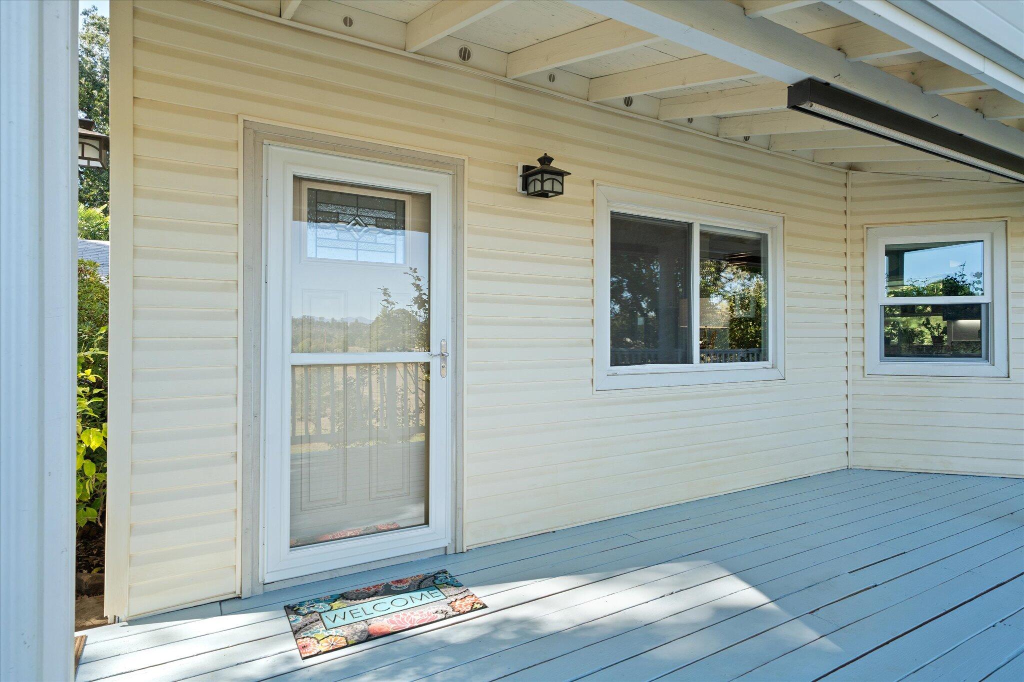 10241 Deschutes Road Palo Cedro, CA 96073 - Photo 7 of 56 a view of front door of house