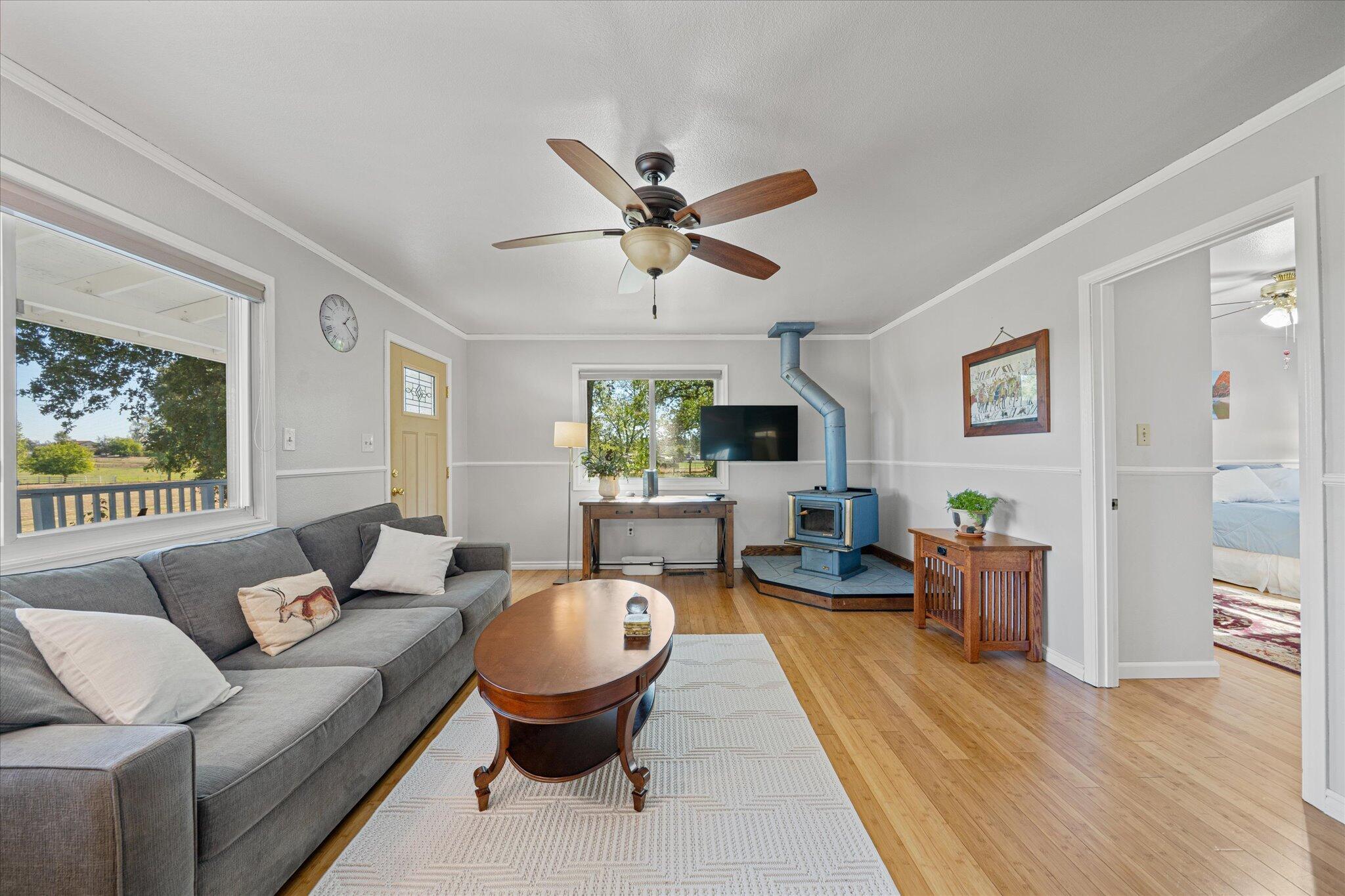 10241 Deschutes Road Palo Cedro, CA 96073 - Photo 10 of 56 a living room with furniture