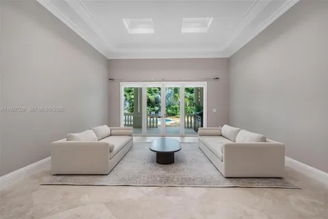 a bedroom with a bed and a table in it