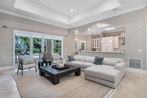 a bathroom with a shower sink and mirror