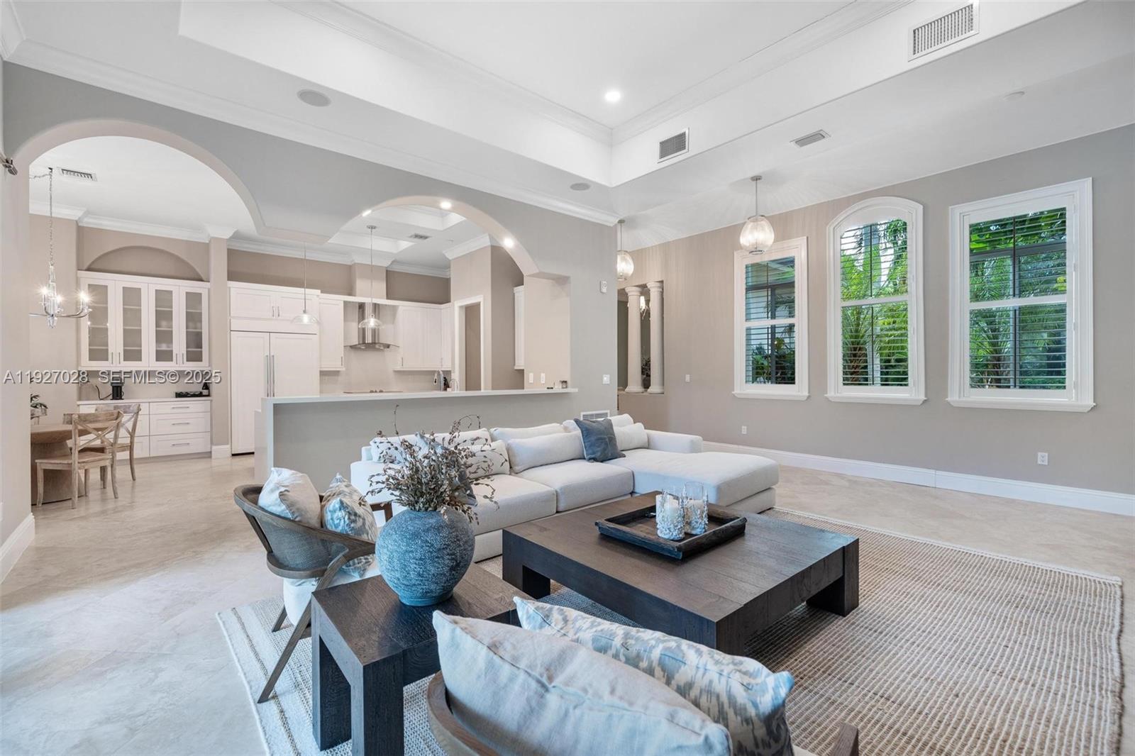 6890 Southwest 94th Street Pinecrest, FL 33156 - Photo 33 of 94 a living room with furniture and windows