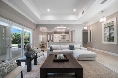 a bedroom with bed and wooden floor