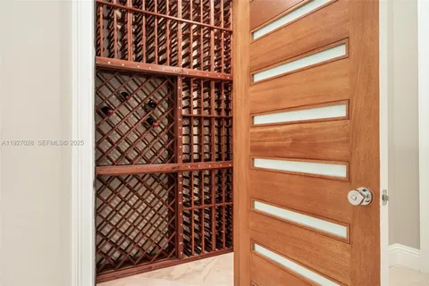 an aerial view of a house with outdoor space and street view