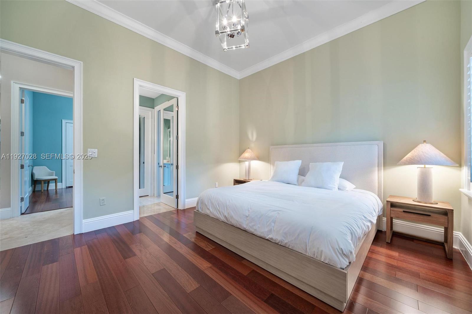 6890 Southwest 94th Street Pinecrest, FL 33156 - Photo 59 of 94 a bedroom with bed and wooden floor