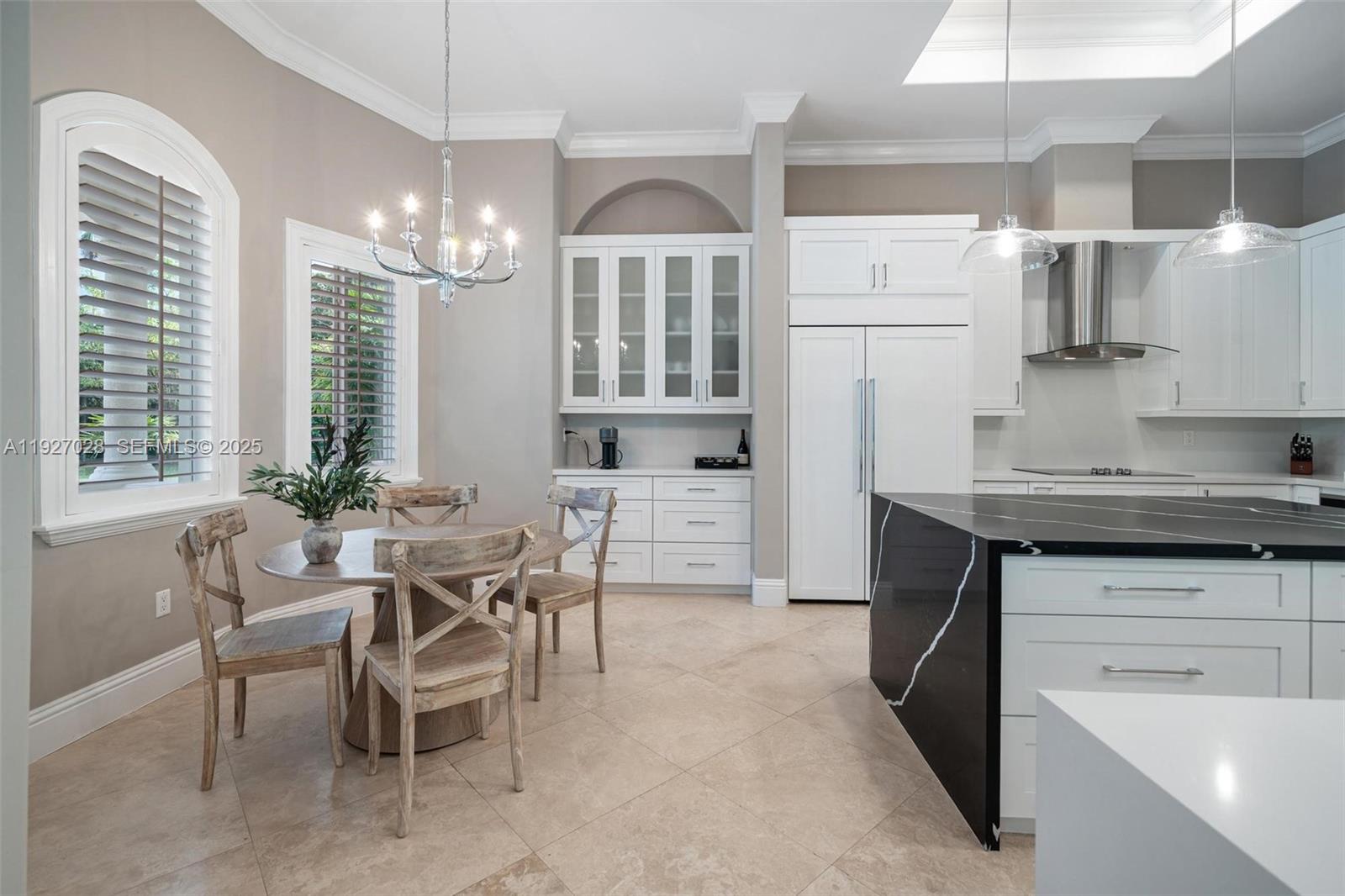 6890 Southwest 94th Street Pinecrest, FL 33156 - Photo 7 of 94 a kitchen with cabinets and chairs