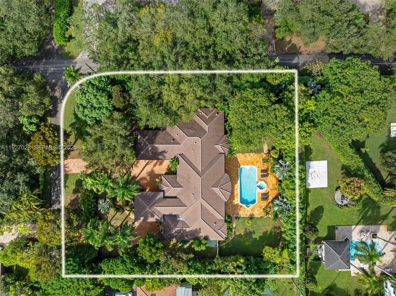 6890 Southwest 94th Street Pinecrest, FL 33156 - Photo 75 of 94 an aerial view of a house with a yard and large trees