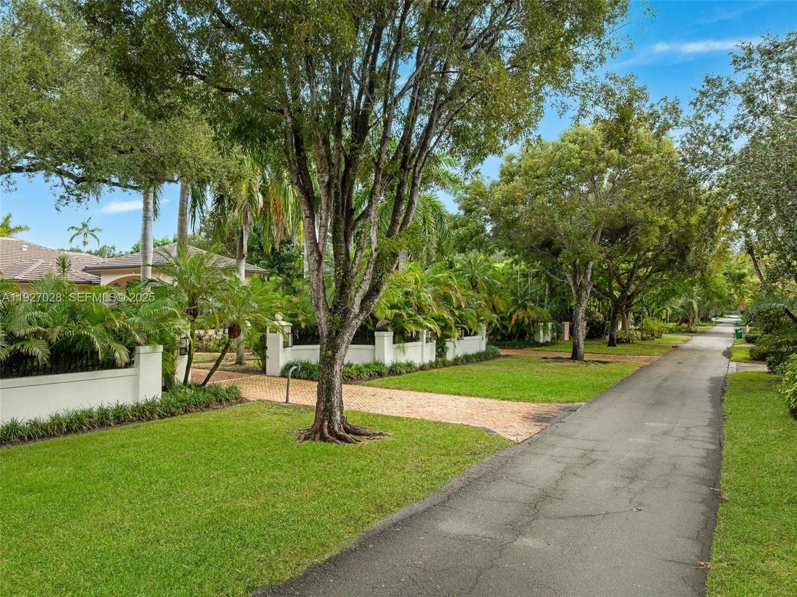 6890 Southwest 94th Street Pinecrest, FL 33156 - Photo 94 of 94 a view of a park with tree s
