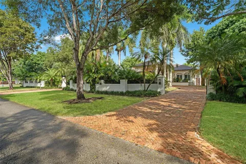 a front view of a house with a porch