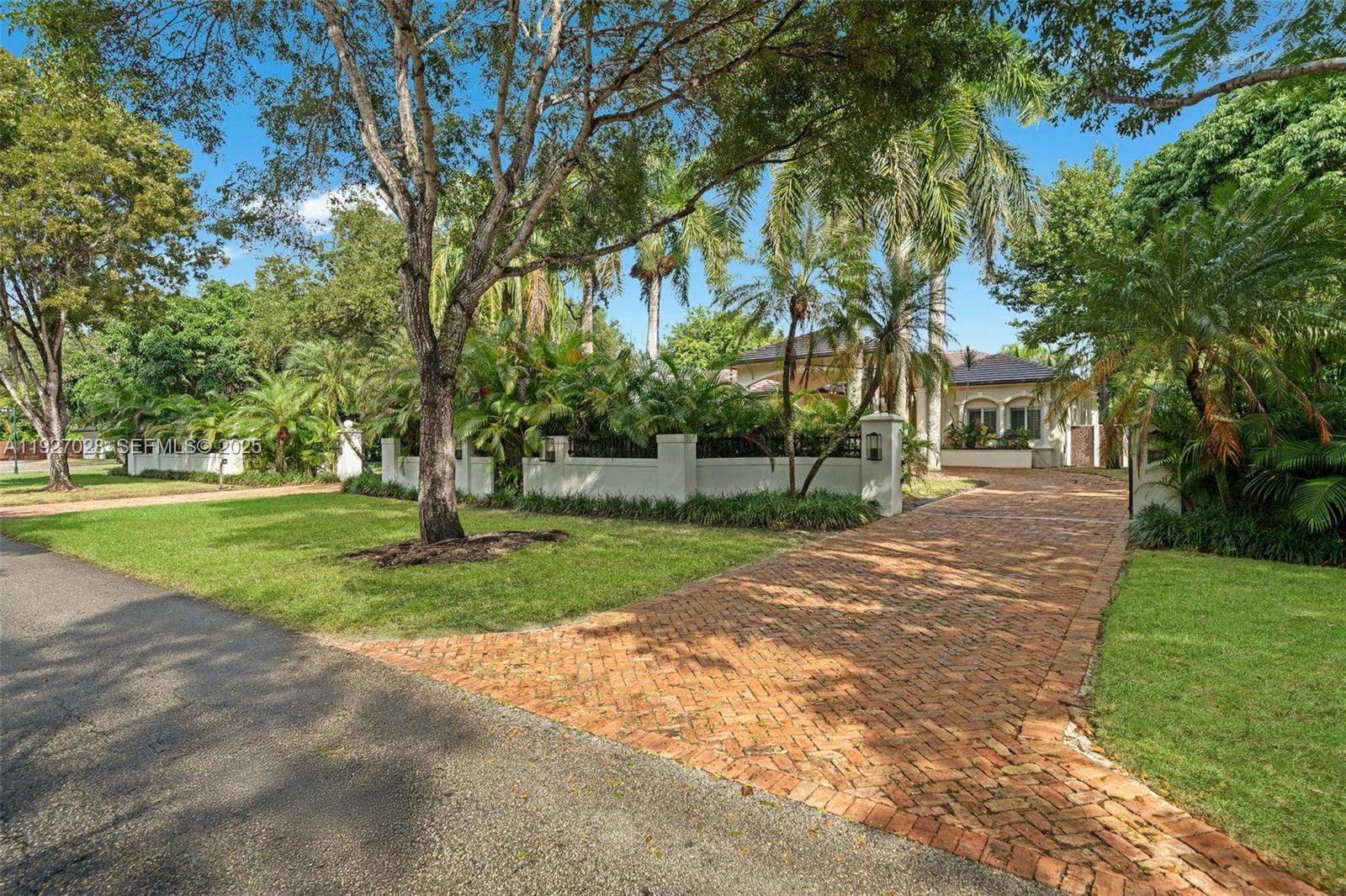 6890 Southwest 94th Street Pinecrest, FL 33156 - Photo 10 of 94 a view of a park with tree s