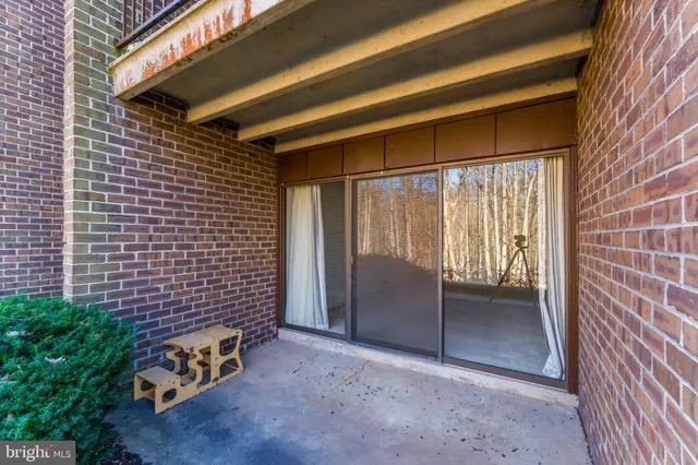 a view of a building with a yard