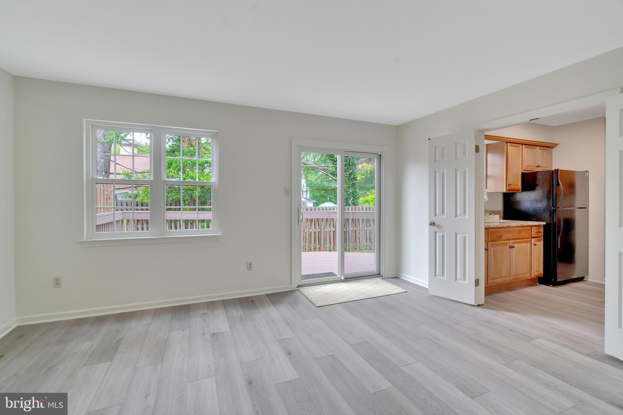 431 Eagle Road, Unit 16 Wayne, PA 19087 - Photo 24 of 48 wooden floor in an empty room with a window