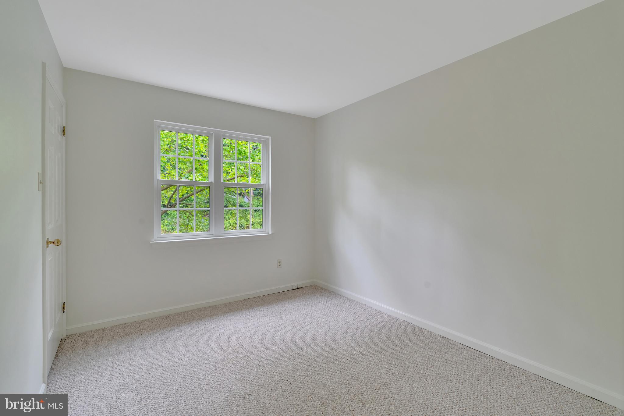 431 Eagle Road, Unit 16 Wayne, PA 19087 - Photo 28 of 48 an empty room with a window