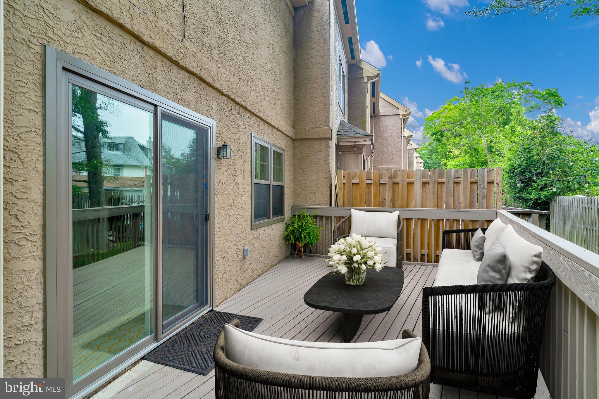431 Eagle Road, Unit 16 Wayne, PA 19087 - Photo 3 of 48 a view of a patio filled with furniture