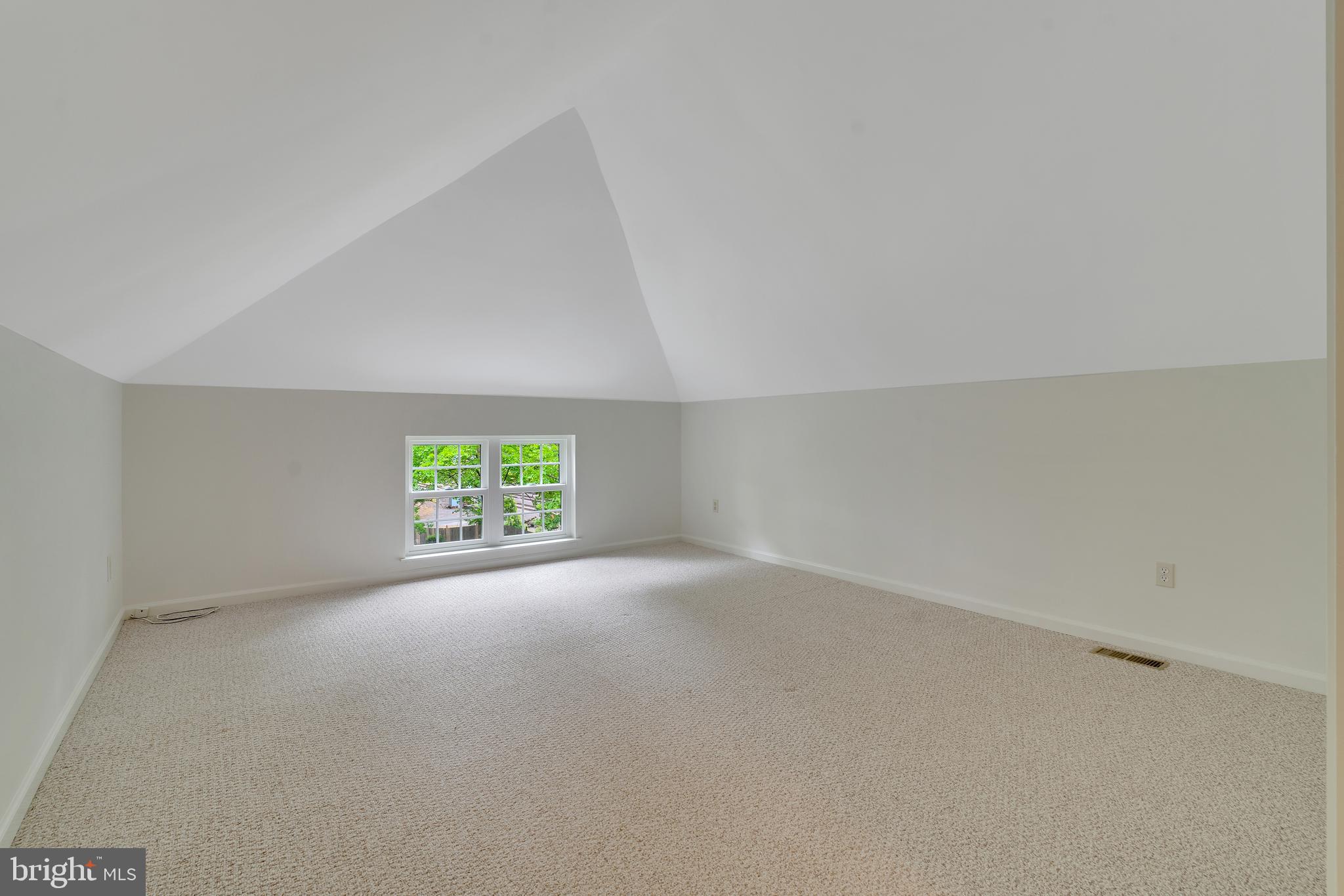 431 Eagle Road, Unit 16 Wayne, PA 19087 - Photo 41 of 48 an empty room with windows and yard