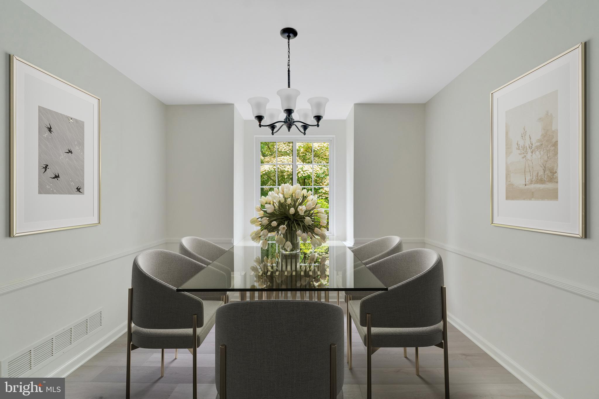431 Eagle Road, Unit 16 Wayne, PA 19087 - Photo 8 of 48 a view of a dining room with furniture and chandelier