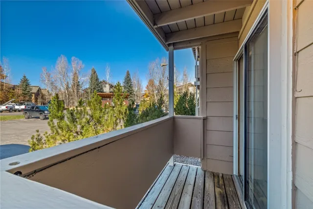 a view of balcony with furniture