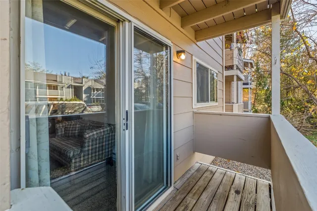 a view of a balcony from a hallway