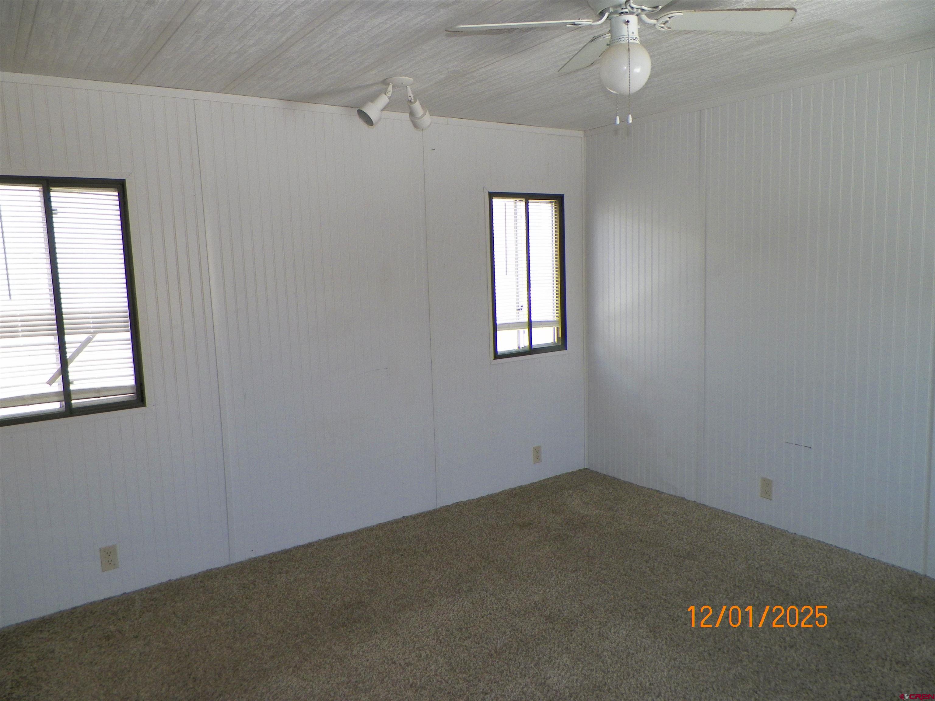 240 Southwest 13th Circle Cedaredge, CO 81413 - Photo 22 of 30 an empty room with windows