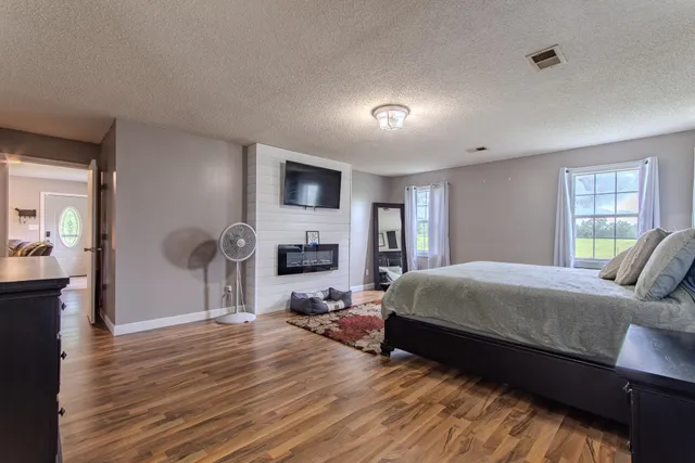 a kitchen with granite countertop stainless steel appliances lots of counter top space