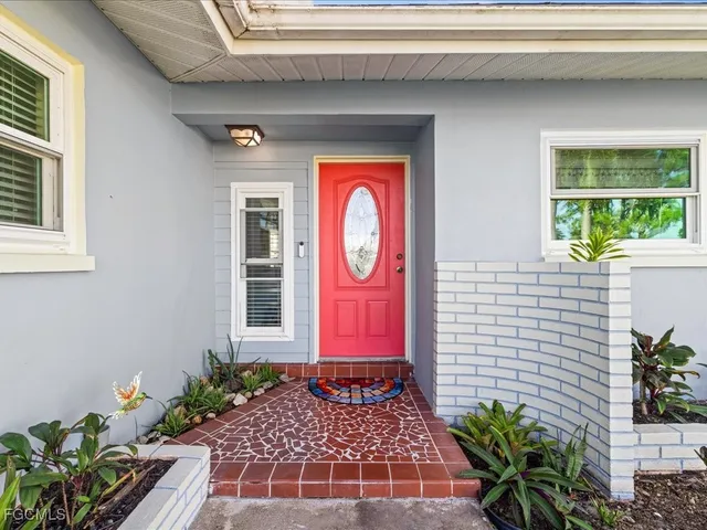 a front view of a house with a porch