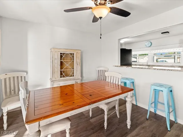 a view of a dining room with furniture