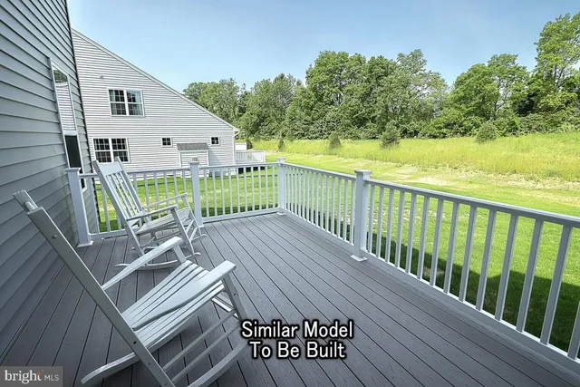 a view of a balcony with wooden floor