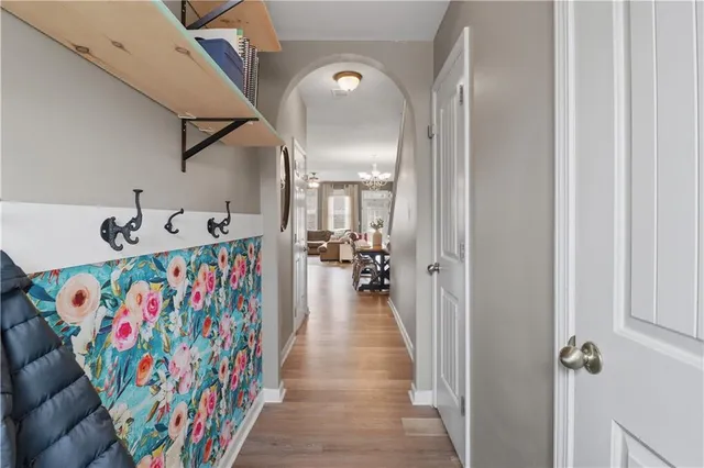 a view of a dining room with furniture and wooden floor