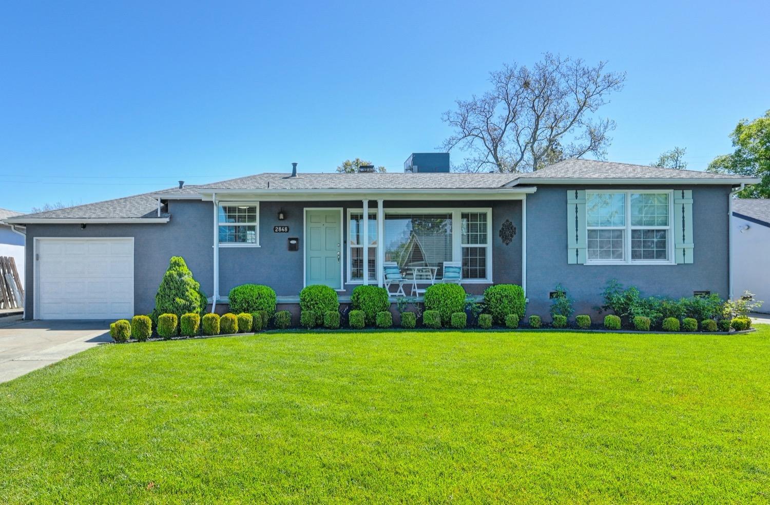 2848 Verna Way Sacramento, CA 95821 - Photo 1 of 1 a view of a house with a yard and potted plants