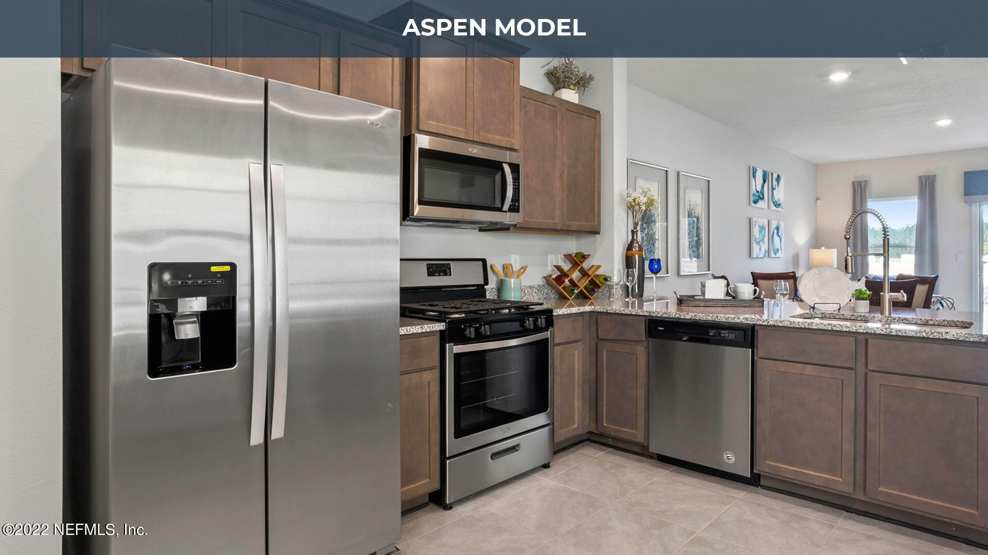 150 Java Lane St. Augustine, FL 32092 - Photo 6 of 36 a kitchen with stainless steel appliances granite countertop a refrigerator and a sink