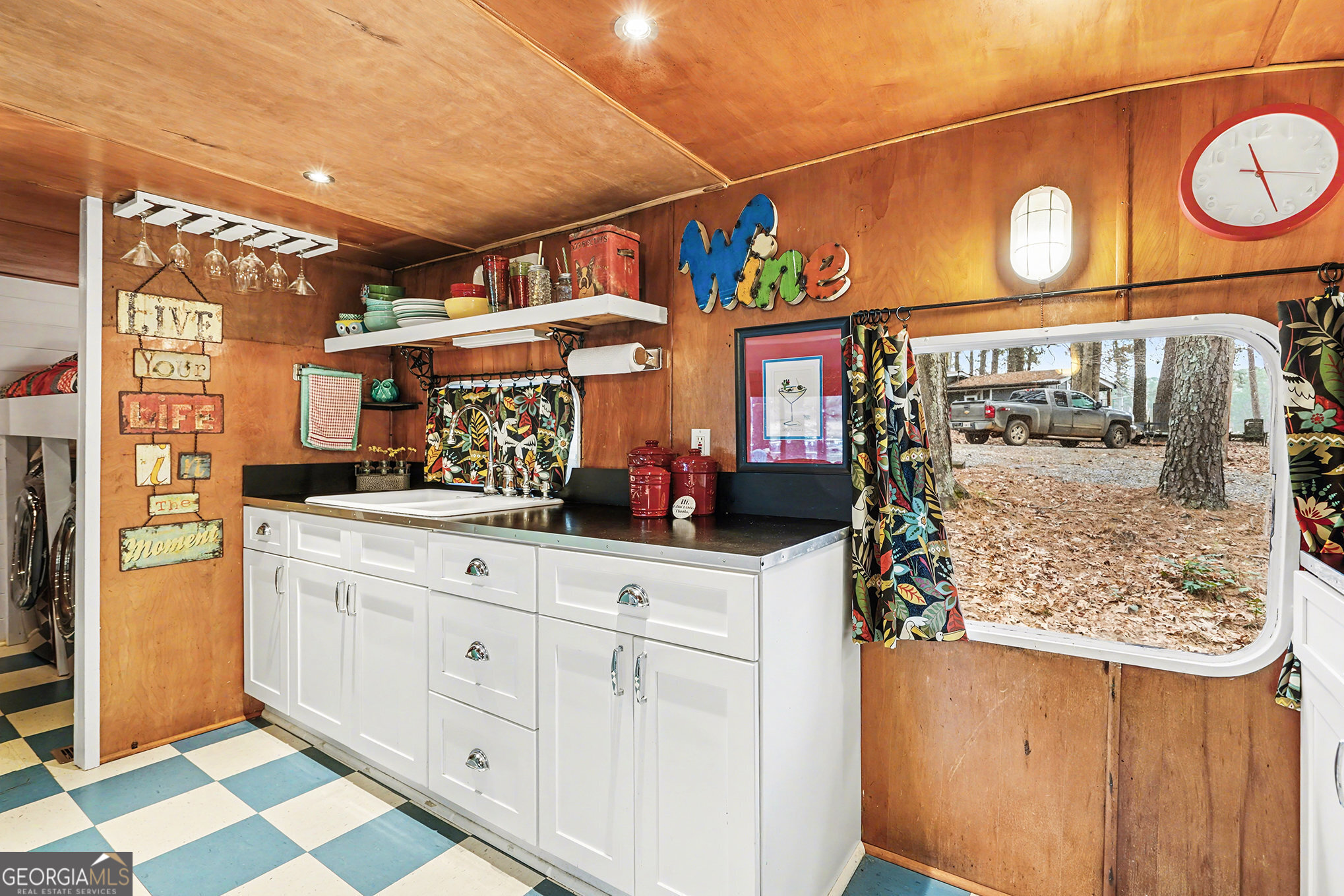 5400 Kings Camp Road Southeast, Unit B22 Acworth, GA 30102 - Photo 11 of 21 a kitchen with stainless steel appliances granite countertop a sink and cabinets