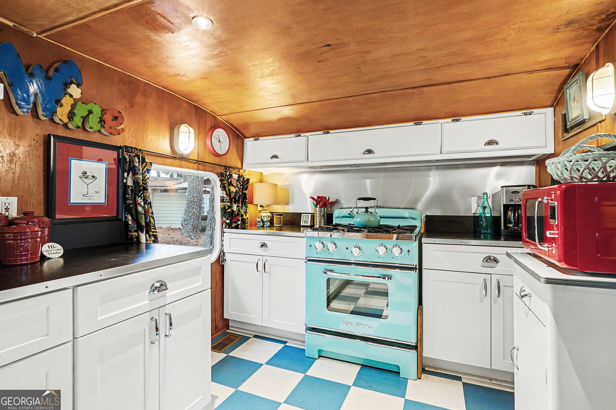 5400 Kings Camp Road Southeast, Unit B22 Acworth, GA 30102 - Photo 12 of 21 a kitchen with cabinets and stainless steel appliances