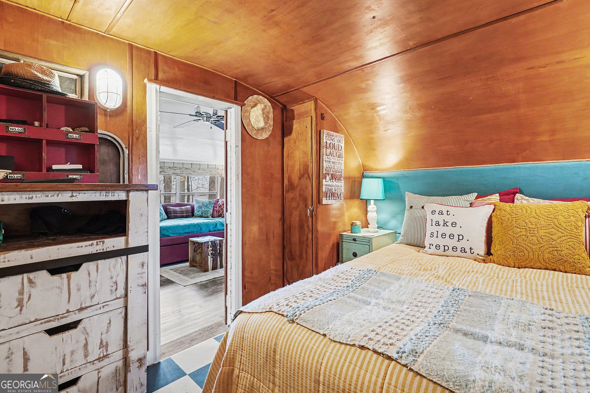 5400 Kings Camp Road Southeast, Unit B22 Acworth, GA 30102 - Photo 15 of 21 a bedroom with a bed and a flat screen tv