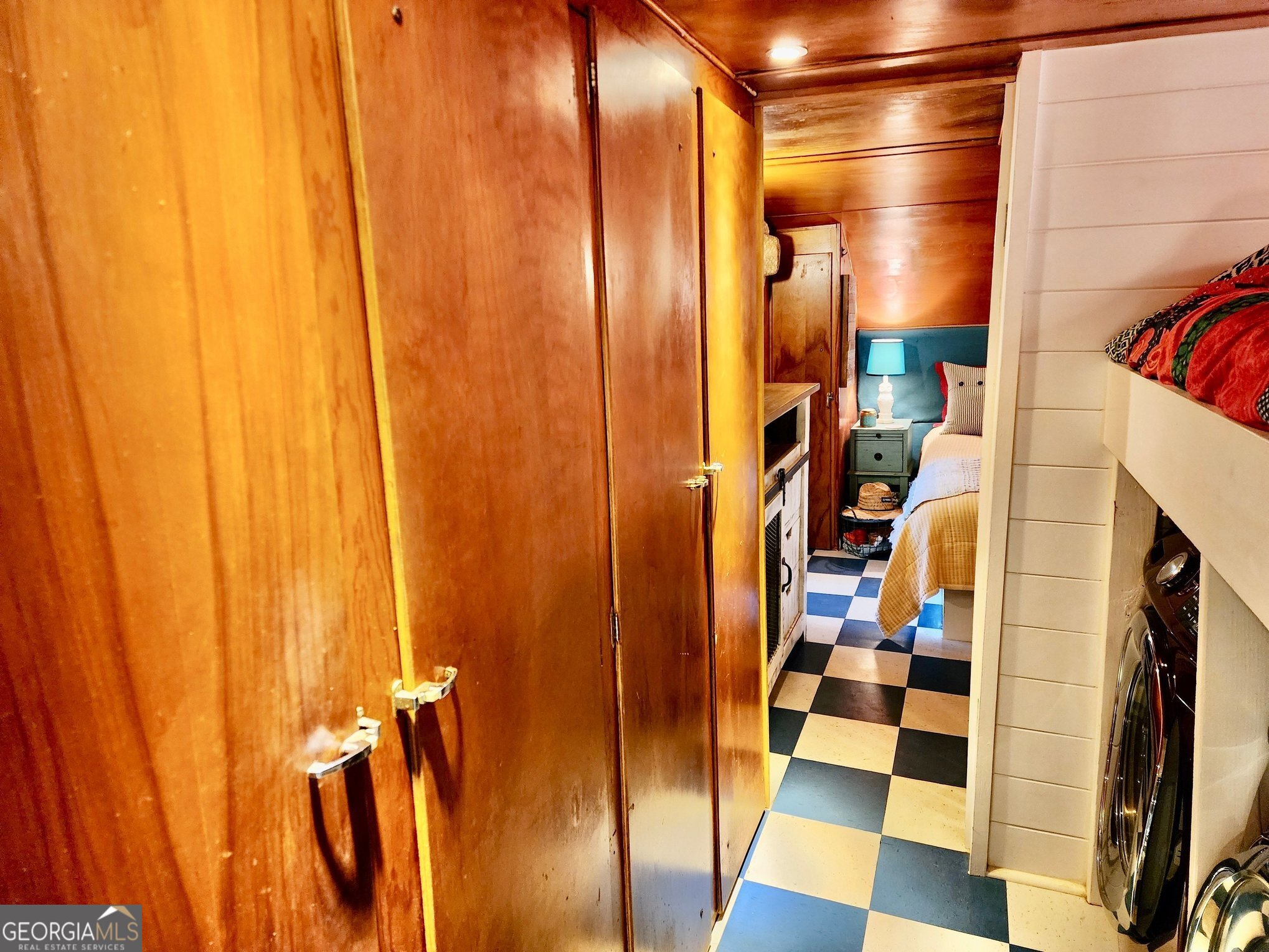 5400 Kings Camp Road Southeast, Unit B22 Acworth, GA 30102 - Photo 18 of 21 a view of walk in closet with clothes and shoes