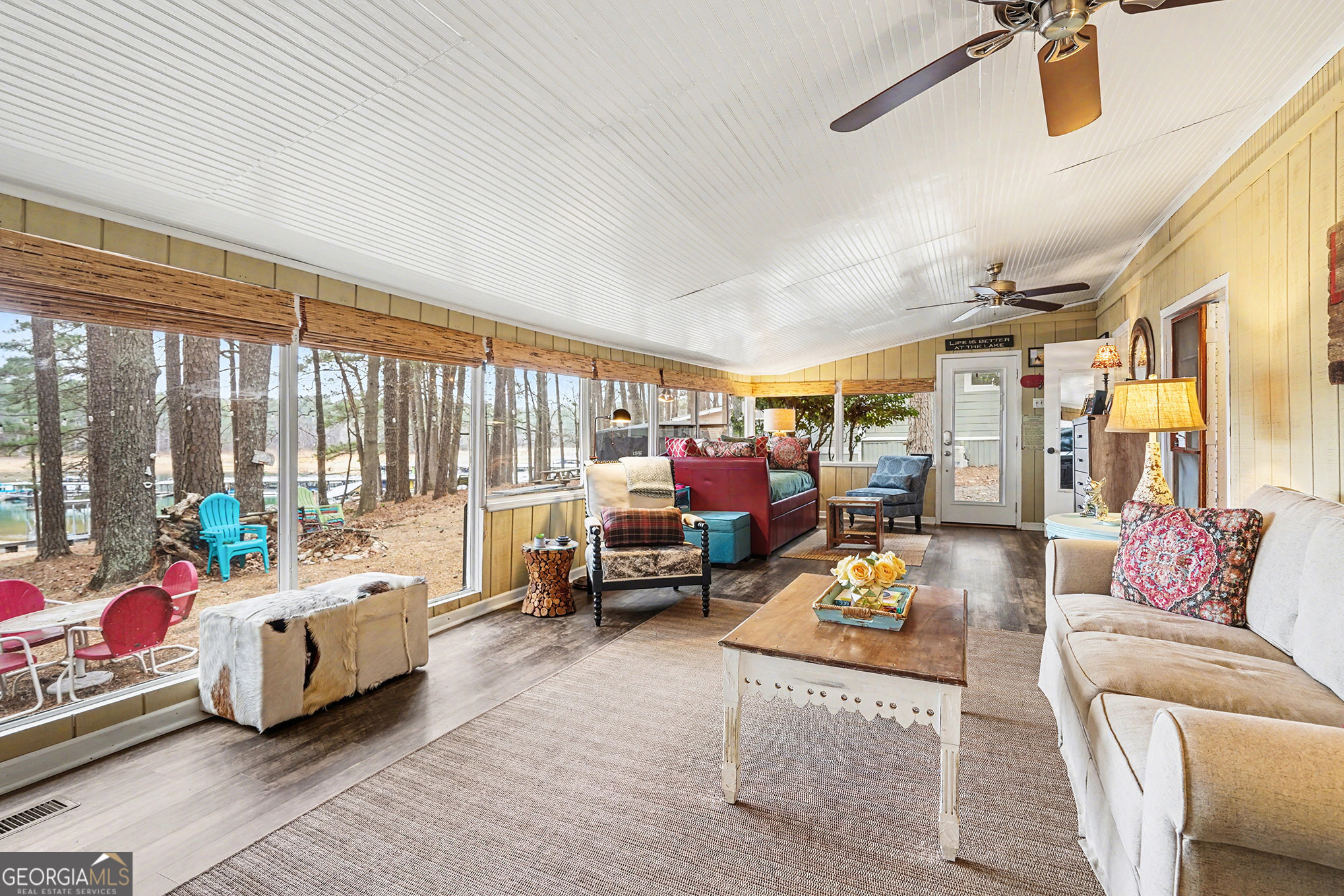 5400 Kings Camp Road Southeast, Unit B22 Acworth, GA 30102 - Photo 9 of 21 a living room with furniture and a large window