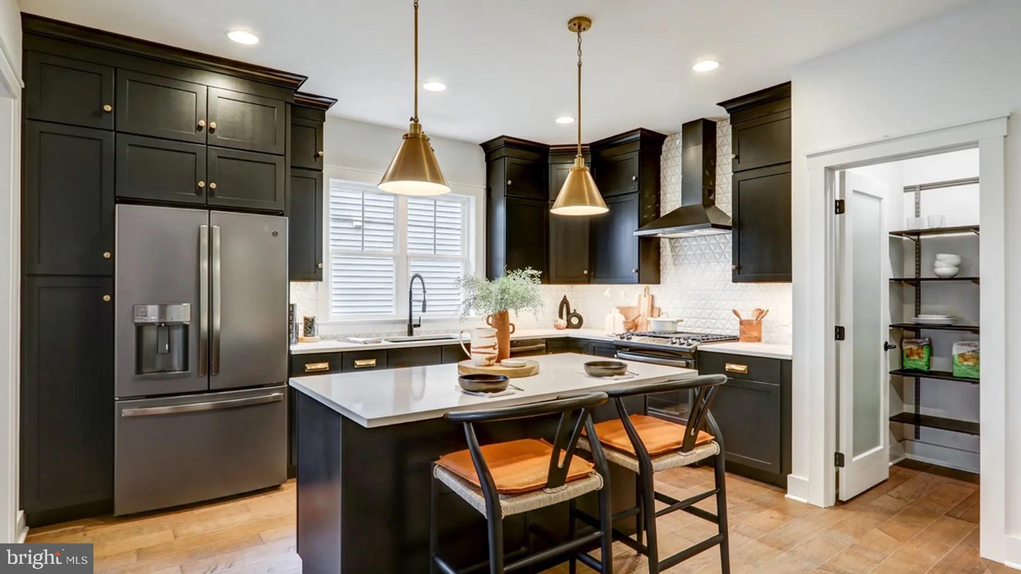 108 Flora Boulevard Lebanon, PA 17042 - Photo 3 of 44 a kitchen with stainless steel appliances granite countertop a refrigerator a sink and a stove