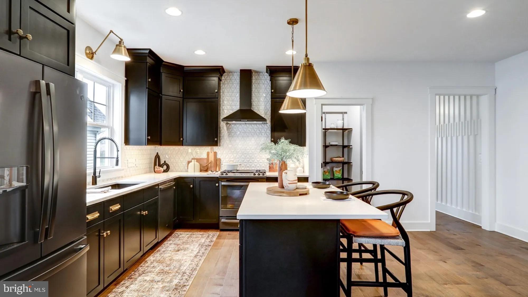108 Flora Boulevard Lebanon, PA 17042 - Photo 5 of 44 a kitchen with stainless steel appliances a sink stove and refrigerator